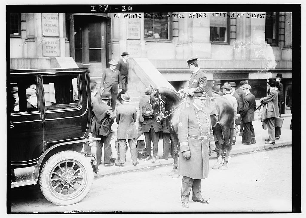 People gathered outside a White Star Line office following the Titanic disaster in April 1912