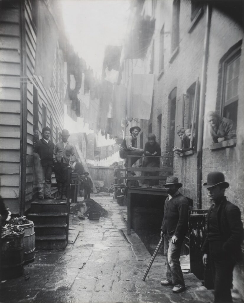 Jacob Riis photograph of residents inside a crowded Bayard Street tenement in New York City's Five Points neighborhood