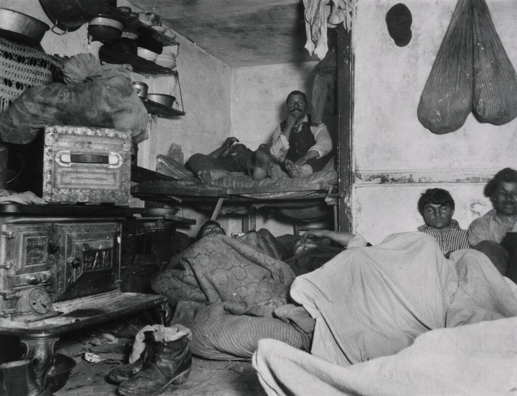 Lodgers in a crowded Bayard street tenement