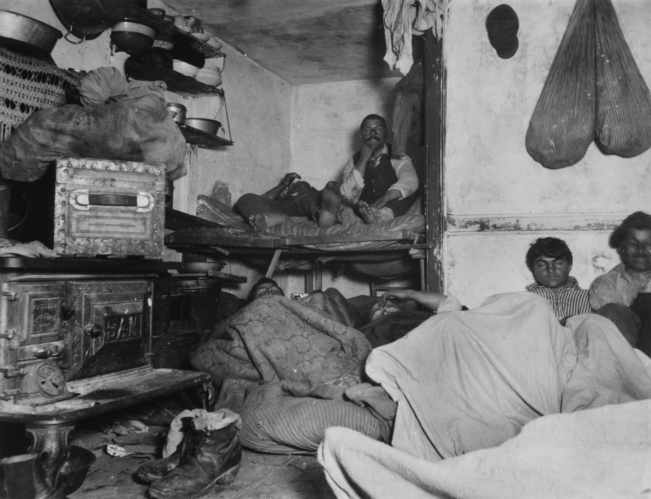 Lodgers in a crowded Bayard street tenement